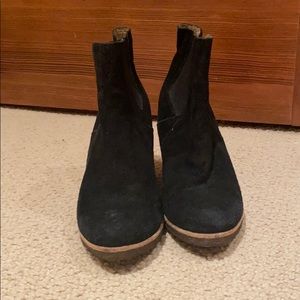 Black appended heeled booties